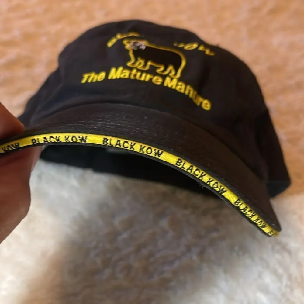 Black Kow the mature, manure hat